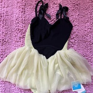 New with Tag girl's swimming suit 8 years old